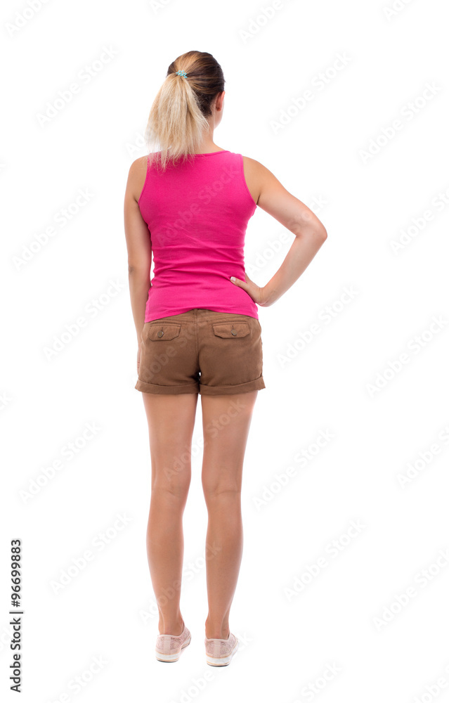 back view of standing young beautiful woman. back view of standing young beautiful woman.