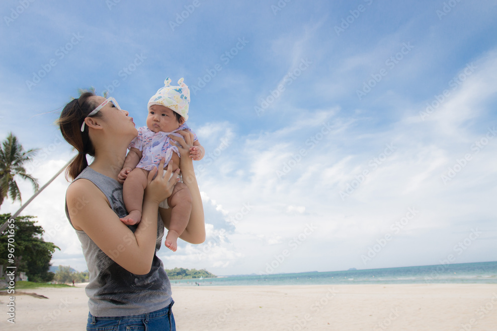 Mother with little daughter on the beach Mother with little daughter on the beach
