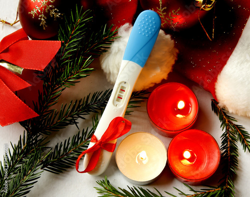 pregnancy test positive result merry christmas present red ribbo