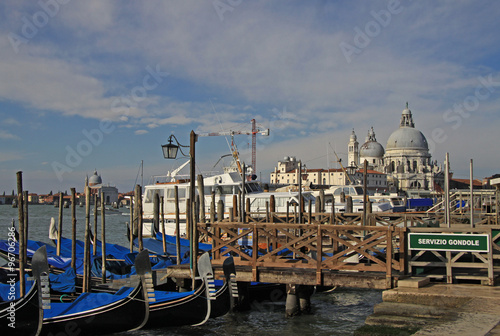 VENICE, ITALY - SEPTEMBER 02, 2012: The Basilica Santa Maria della Salute and parked gondolas in Venice, Italy © shiler_a