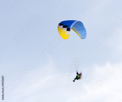 parachute flying in the sky