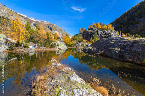 Beautiful pond of Swiss Alps in autumn