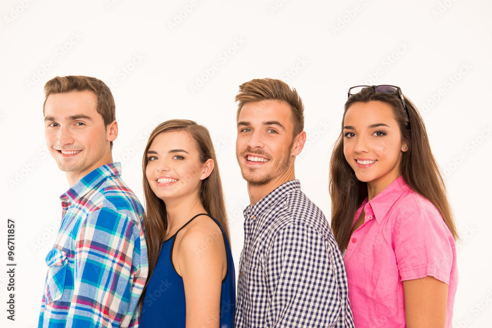 Cheerful teen people standing in a line Cheerful teen people standing in a line