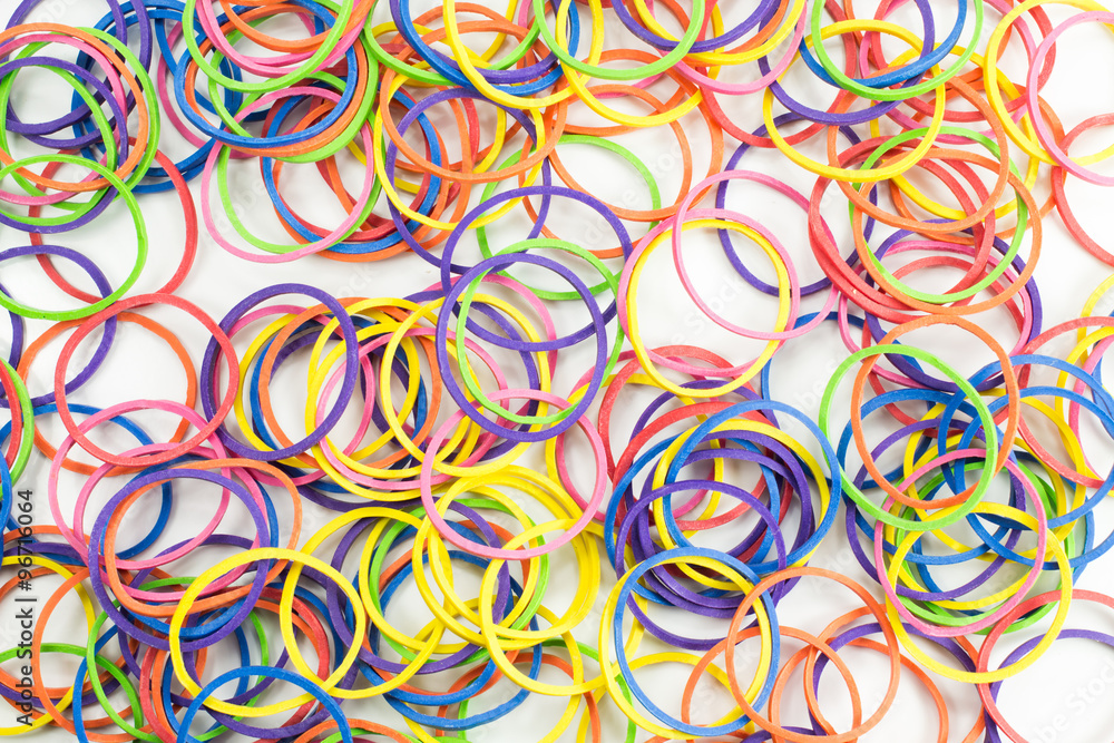 Group of multicolor rubber money bands isolated on white Group of multicolor rubber money bands isolated on white