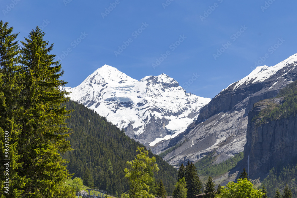 Panorama view of the Alps and Bluemlisalp on the hiking path near Kandersteg, Switzerland