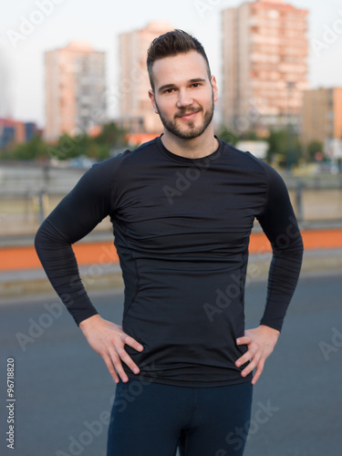 Portrait Of Male Runner On Urban Street