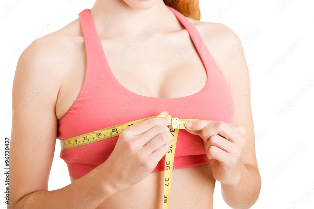Naklejka premium Woman Measuring Up Her Chest