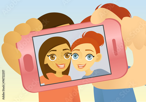 Two friends taking a self-portrait with a cell phone