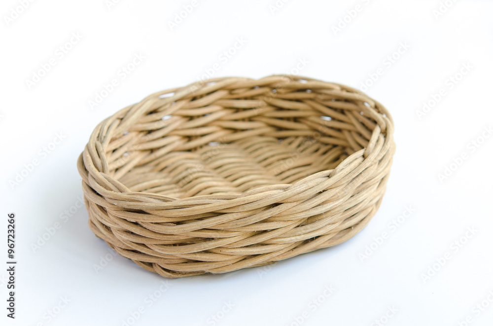 Obraz premium wooden basket on white background