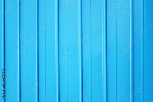 The metallic door in blue color of warehouse