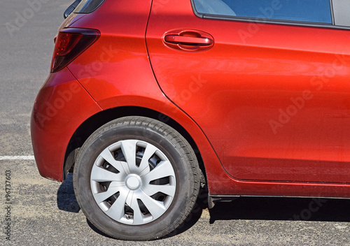 Tire of a red car © majorosl66