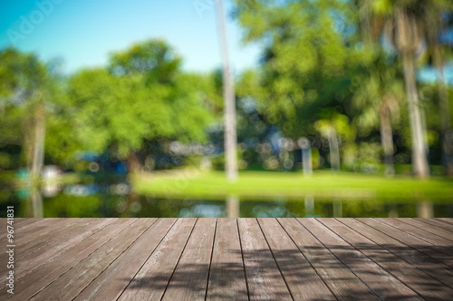 Perspective wood and bokeh light background