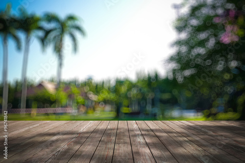 Perspective wood and bokeh light background