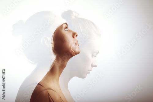 Bild auf Leinwand Double exposure portrait of attractive and young girl