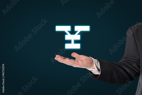 Businessman holding a communication symbol