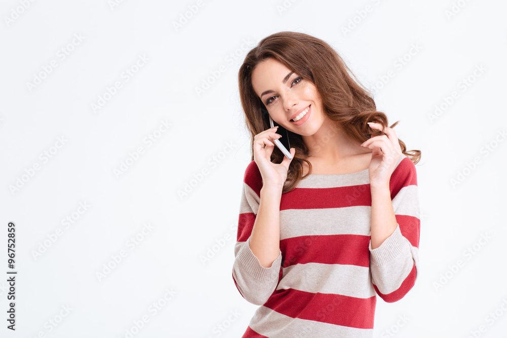 Smiling attractive woman talking on the phone Smiling attractive woman talking on the phone