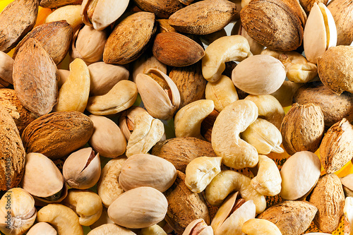 Foto Natural background made from different kinds of nuts