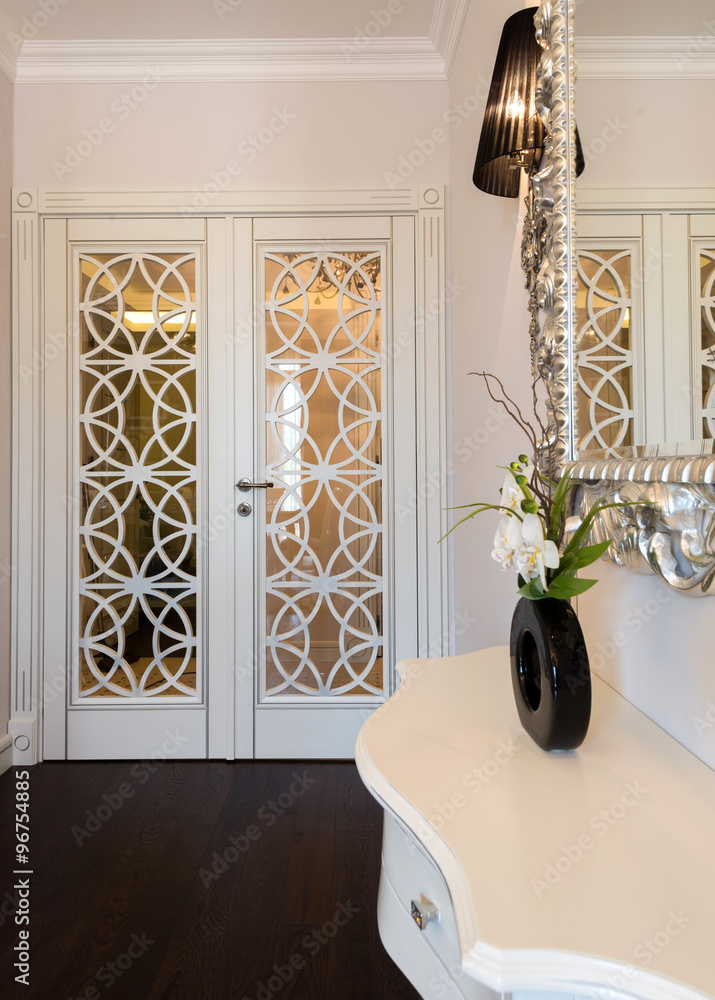 Fototapeta premium White wooden door with decorative details