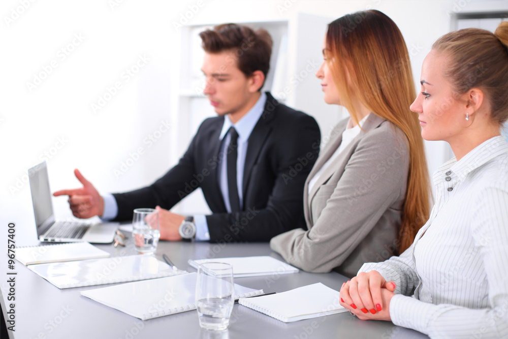 Group of Business people at meeting, focus on blond business woman Group of Business people at meeting, focus on blond business woman