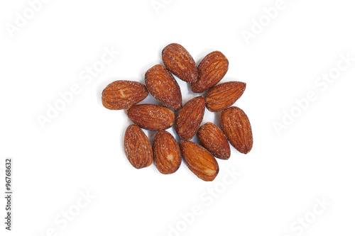 Salted almonds on white background