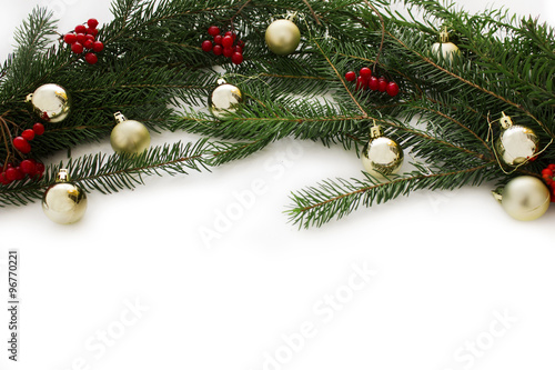 Christmas frame for greeting card design. Decorations with Christmas tree and Christmas toys isolated on white background. New year card frame.