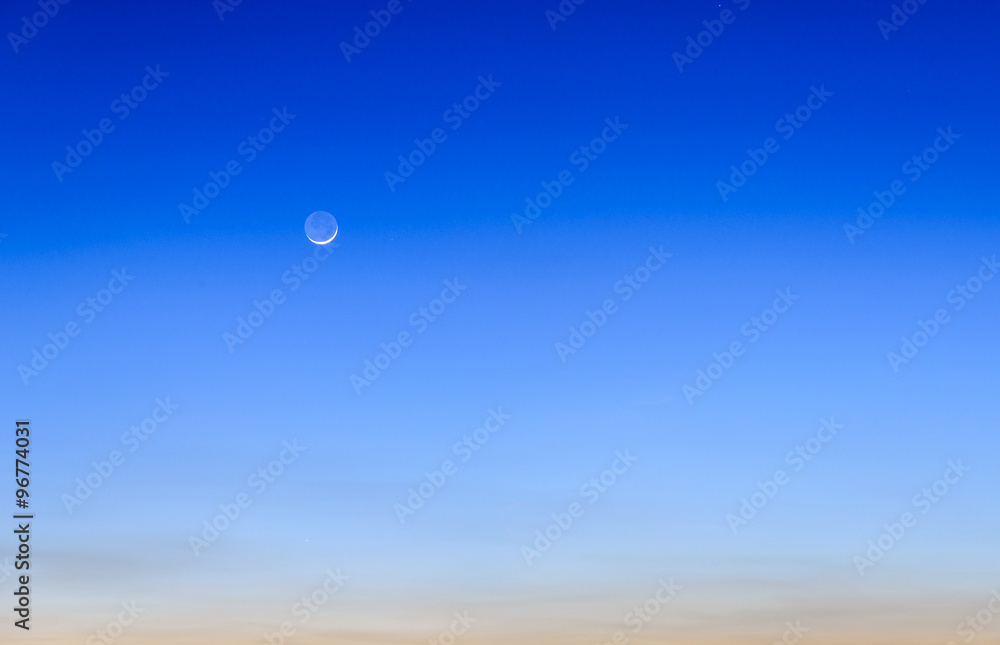 twilight sky with the crescent moon in winter at the north of Thailand twilight sky with the crescent moon in winter at the north of Thailand