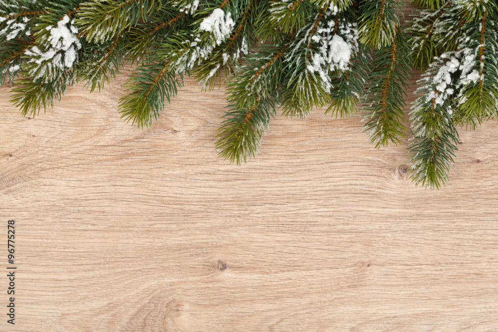 Christmas fir tree on wooden board Christmas fir tree on wooden board