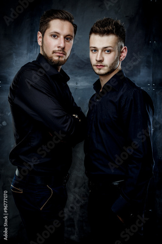 Elegant young handsome men. Studio fashion photo © smmartynenko