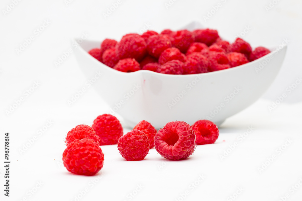 raspberries on white background raspberries on white background