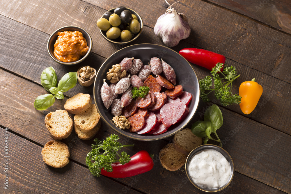 appetizer with sausages,cheese,olive and nuts appetizer with sausages,cheese,olive and nuts