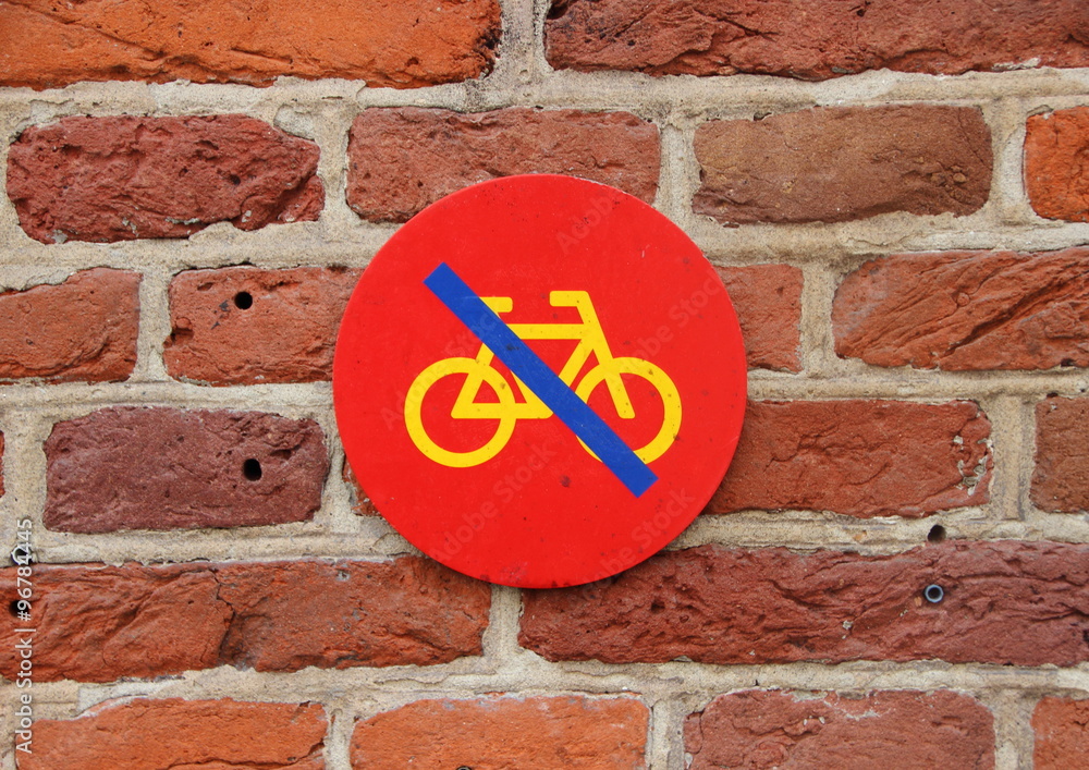No Bicycle Parking Sign on Red Tile Wall No Bicycle Parking Sign on Red Tile Wall