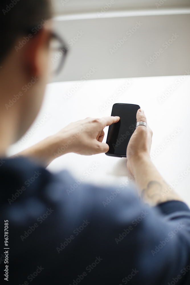 Young man with smartphone