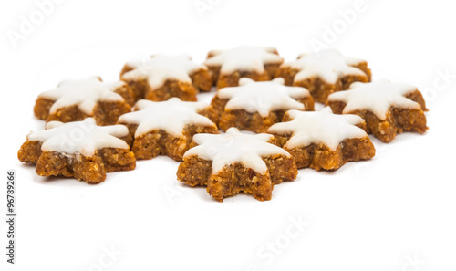 Christmas star shaped cookie with white icing