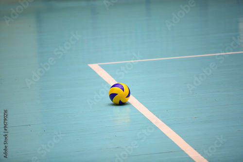 Volleyball ball on the floor photo