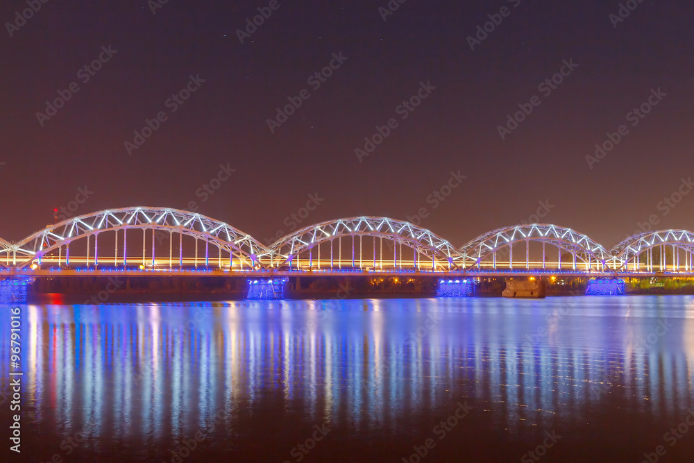 Riga. Railway bridge at night.