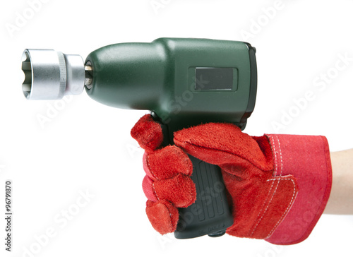 the hand holds air impact wrench