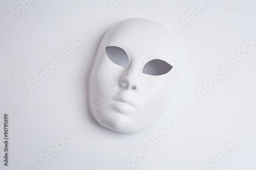 white venetian mask on a white background