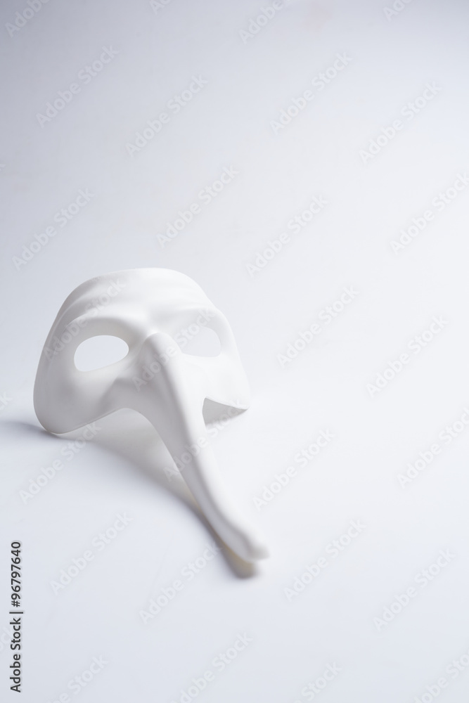 white venetian mask on a white background white venetian mask on a white background