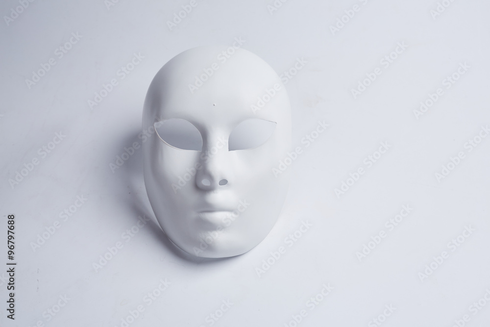 white venetian mask on a white background