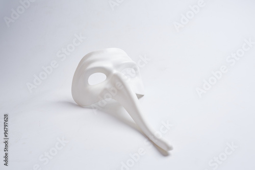 white venetian mask on a white background © photoniko