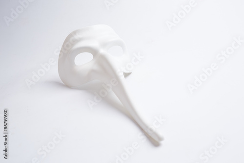white venetian mask on a white background © photoniko