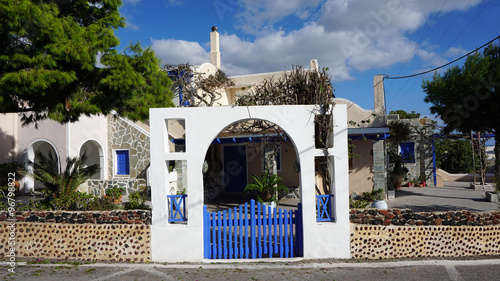 door in small greece village exo gonia on santorini photo