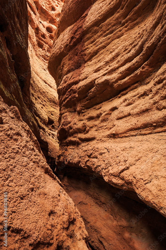 rough wall of valley in red sandstone rough wall of valley in red sandstone