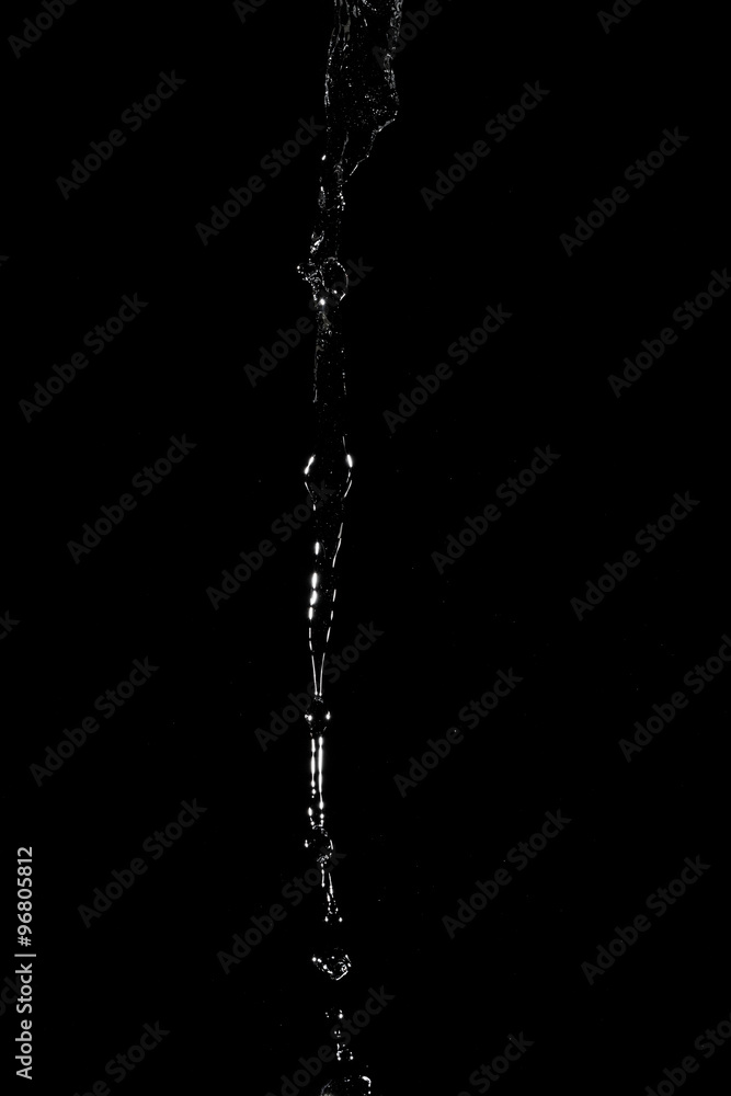 Abstract splashes and drops of water on black background. Abstract splashes and drops of water on black background.
