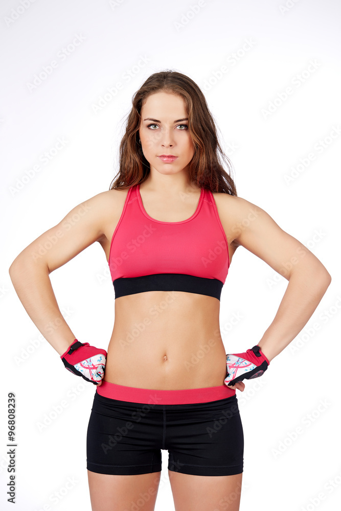Young beautiful fitness girl isolated on white Young beautiful fitness girl isolated on white