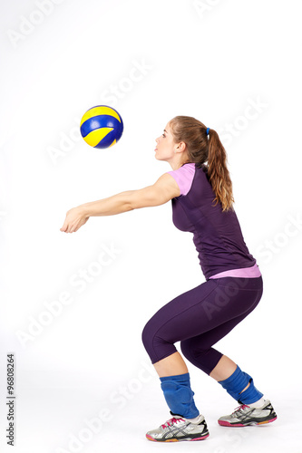 young fit volleyball player. Isolated on white in studio
