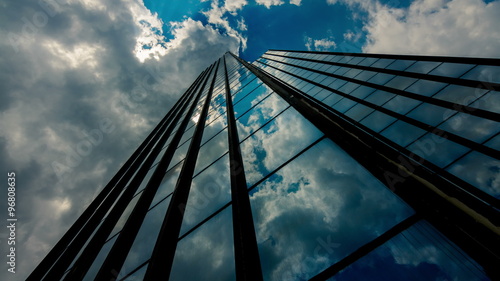 Wallpaper Mural 4K 25p office building,skyscraper,sun rays and dramatic clouds reflections,glass Torontodigital.ca