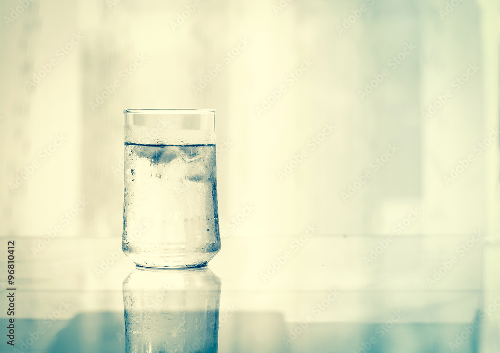 glass of Cool fresh drink with ice cube on the table glass of Cool fresh drink with ice cube on the table
