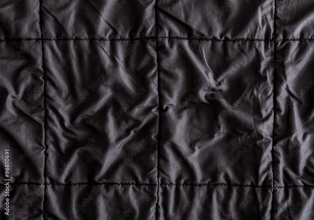 close up on Crumpled black fabric with seam line texture close up on Crumpled black fabric with seam line texture