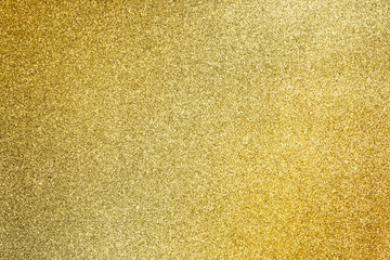 close up golden glitter texture for glamour holiday background